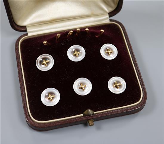 A cased set six piece French 18ct yellow metal and mother of pearl dress stud set.